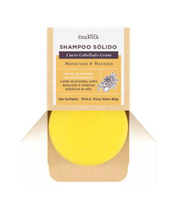 Shampoo Solido aroma a maracuya y naranja sobre mano
